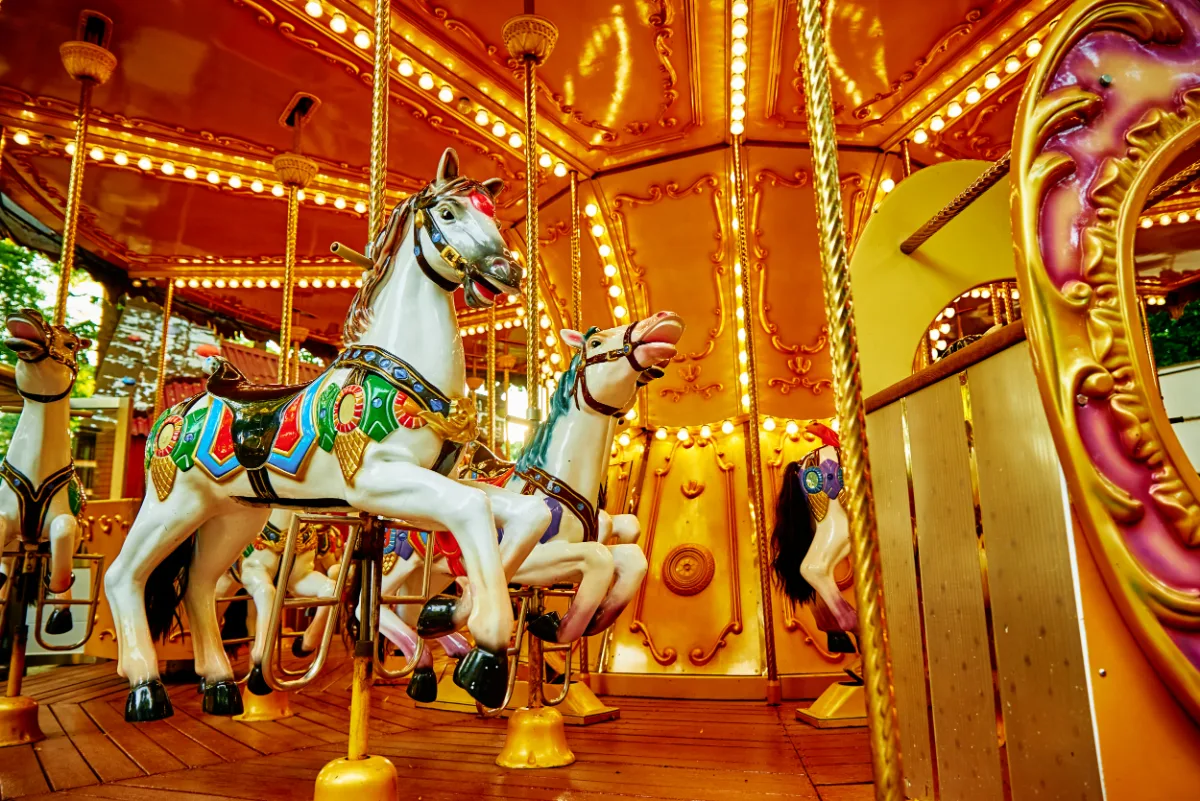 A carousel with horses on it, perfect for a family-friendly outing.